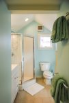 Shared guest bathroom with shower
